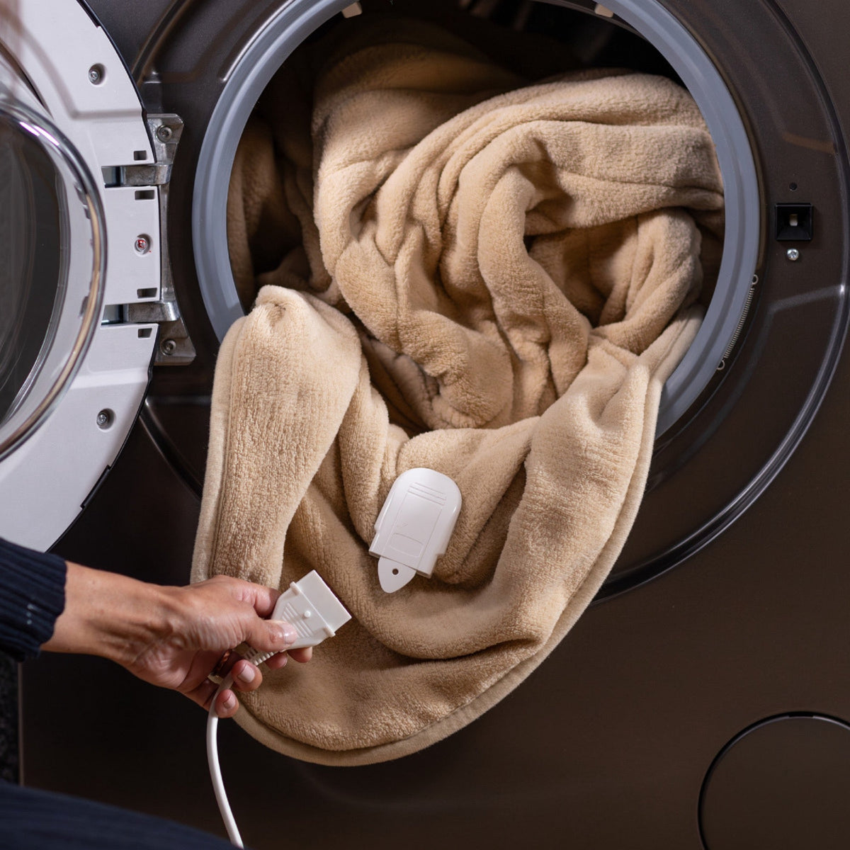 Heated throw in microfleece beige